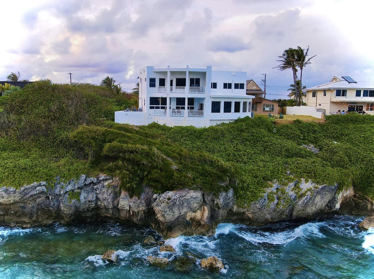 A finished two-storey SABS home on an oceanfront cliff