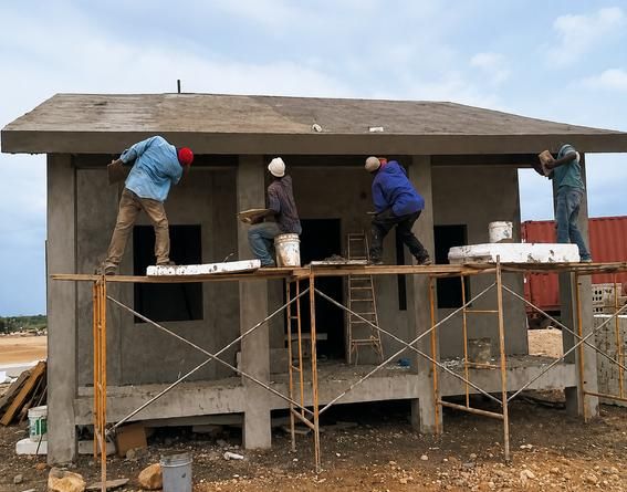 Haitian workers applying SABScrete — Haiti 2011