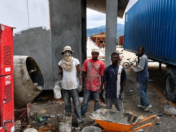 Local crew mixing on site — Haiti 2011