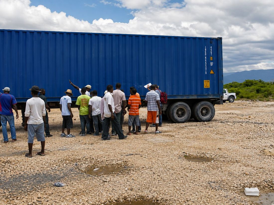 Container kit arrives and the crew unloads — Haiti 2011